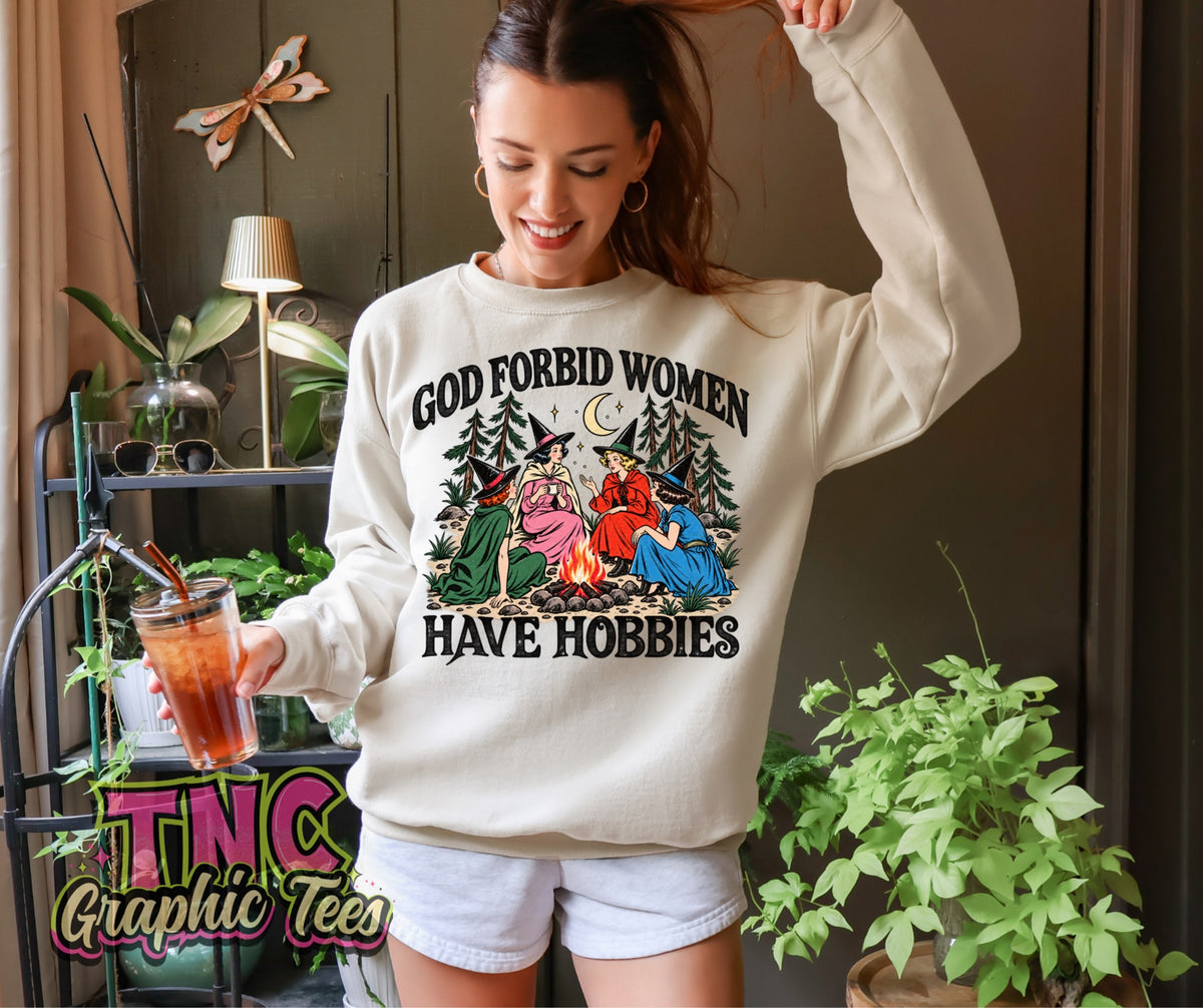 God Forbid Women Have Hobbies crewneck on Ivory Gildan