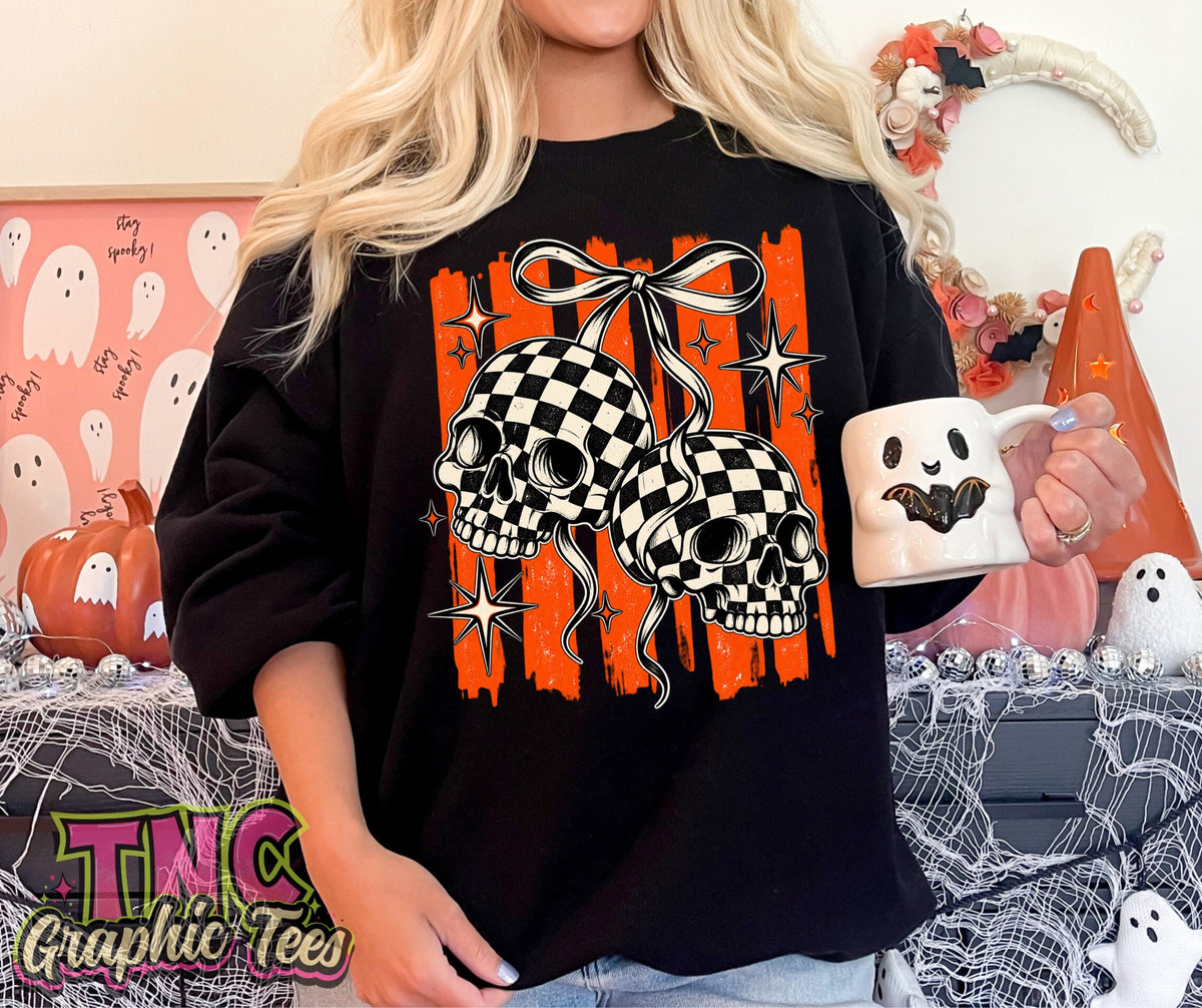 Checkered Skull Bows crewneck on Black Gildan